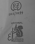 1936-1939: Transitional mark showing both RZM & Squirrel with sword, with original